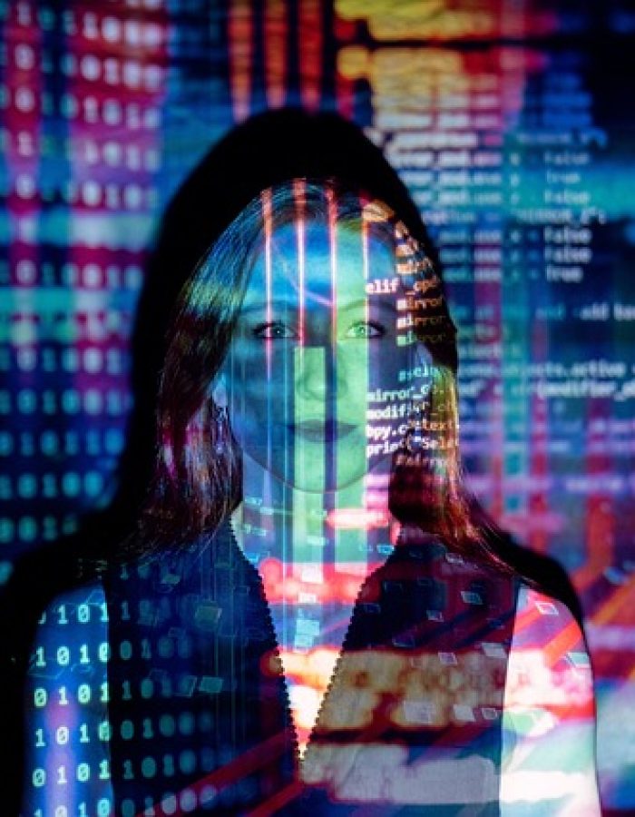 a woman with a blurry image of a computer screen